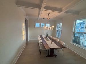 Freshly painted Charleston SC dining room with cream walls and white coffered ceiling