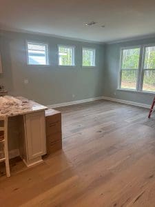 Freshly painted Charleston SC living area with sage green walls during an interior painting project