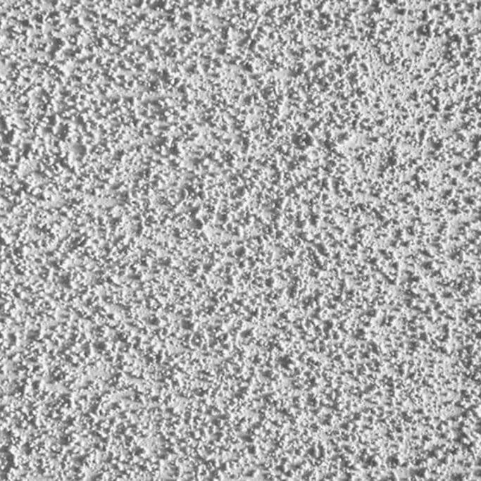 Close-up of a popcorn ceiling texture showing the rough surface homeowners consider when deciding should you remove or paint over popcorn ceilings